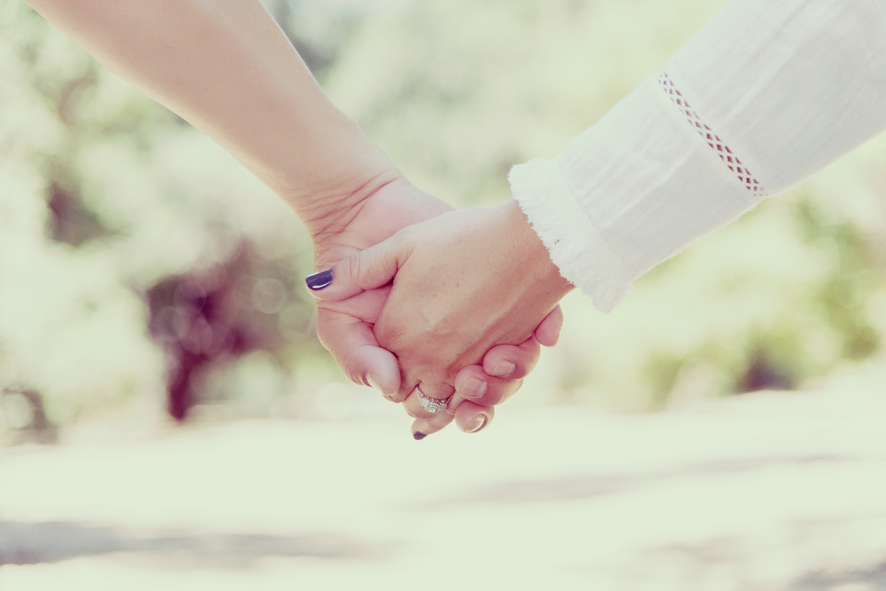 Couple Holding Hands Outdoors